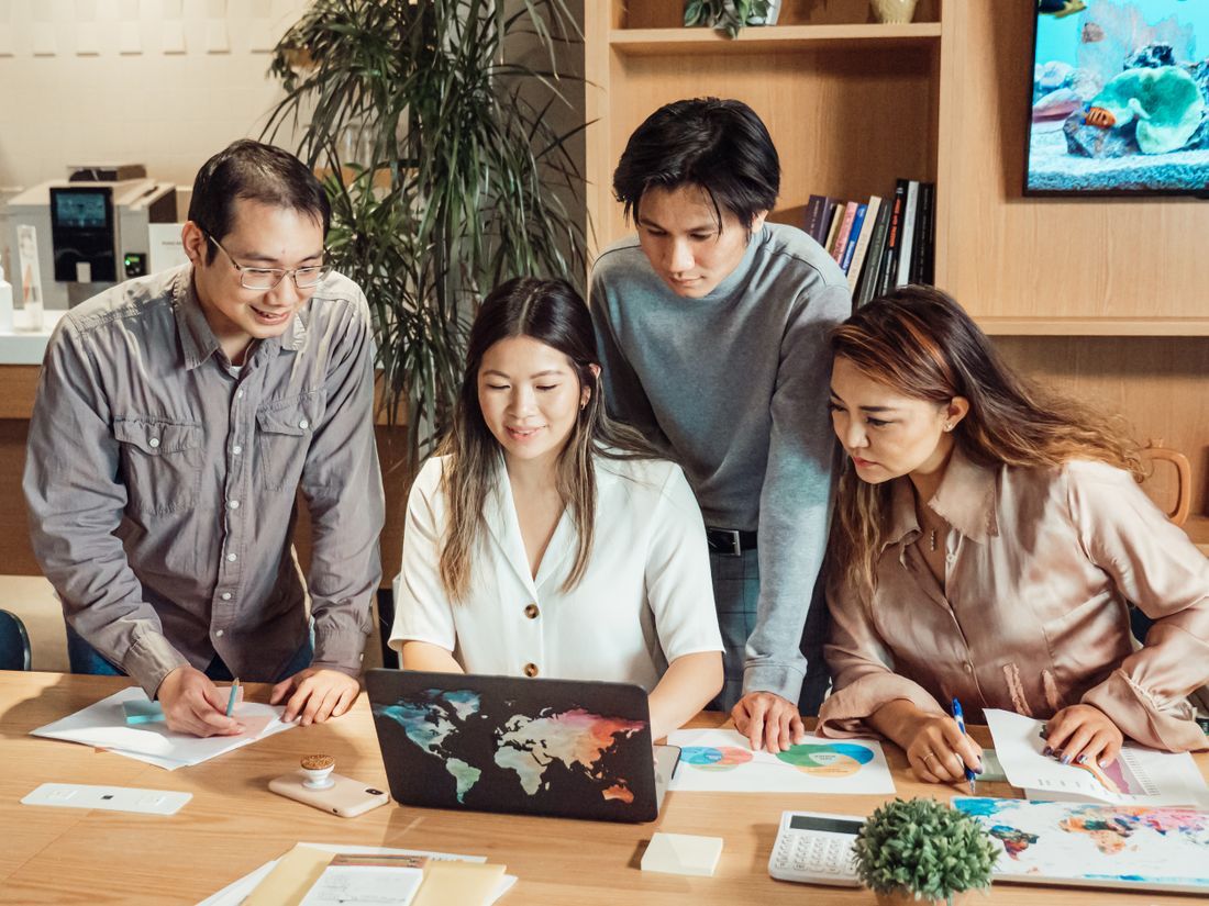 Technical lead at a laptop with a colleague